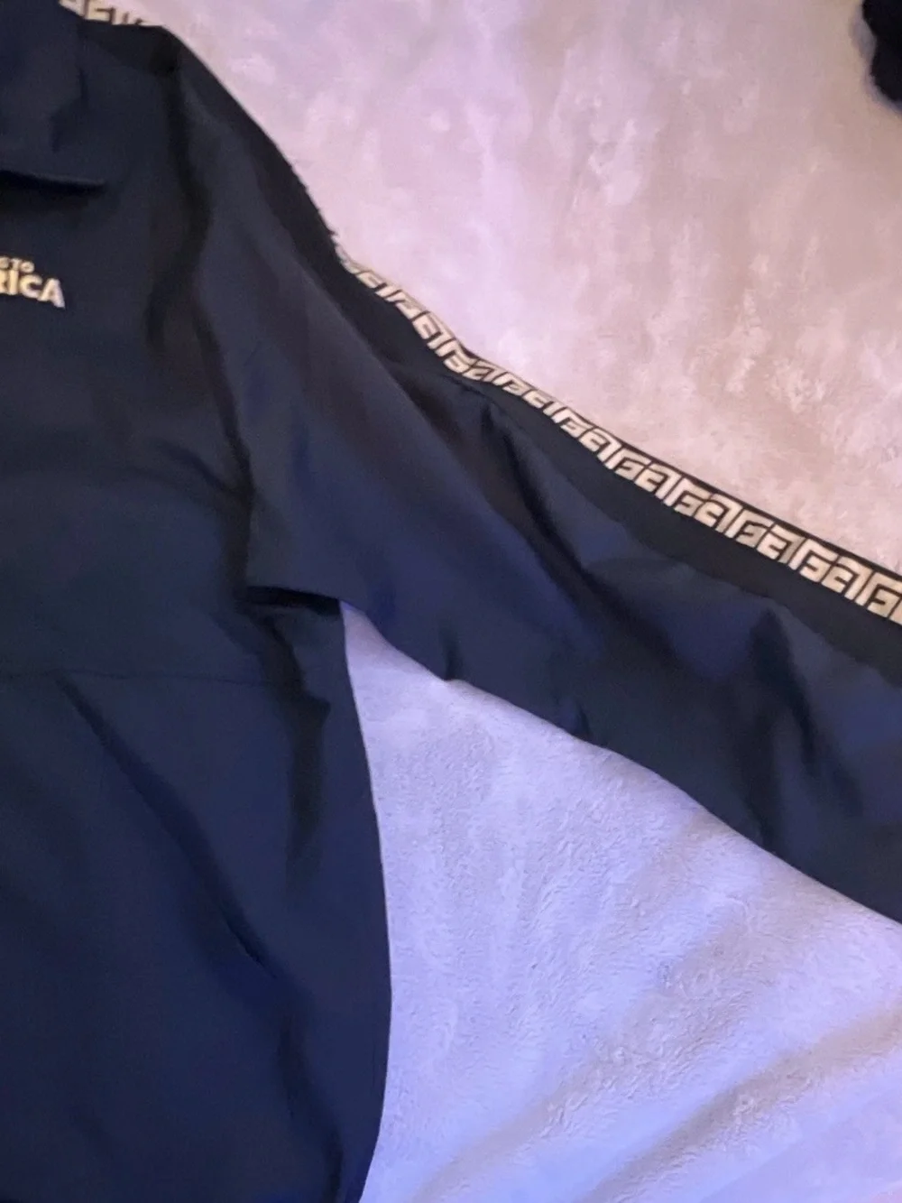 Nike Black Windbreaker Jacket with Gold Sleeve Tape